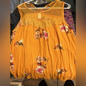 No Boundaries floral yellow tank top with see through chest area
